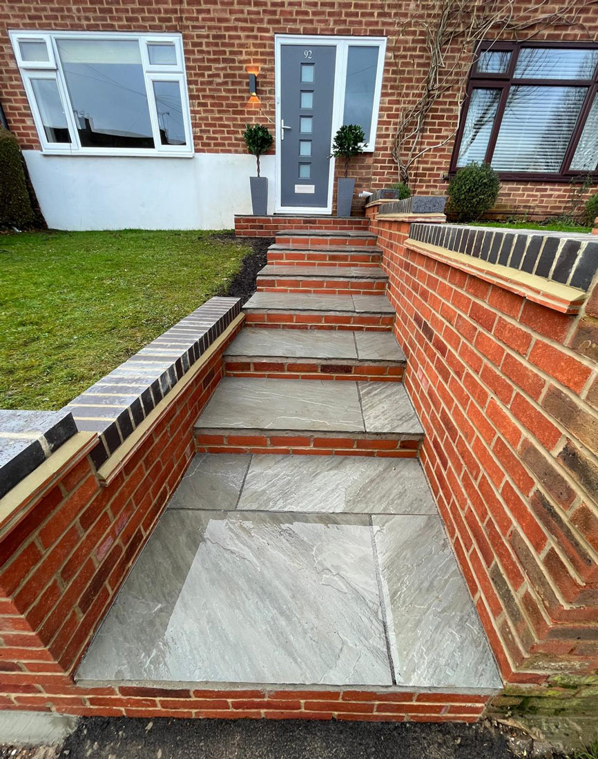 Garden wall and brick steps by Assured Building & Landscaping, Watford